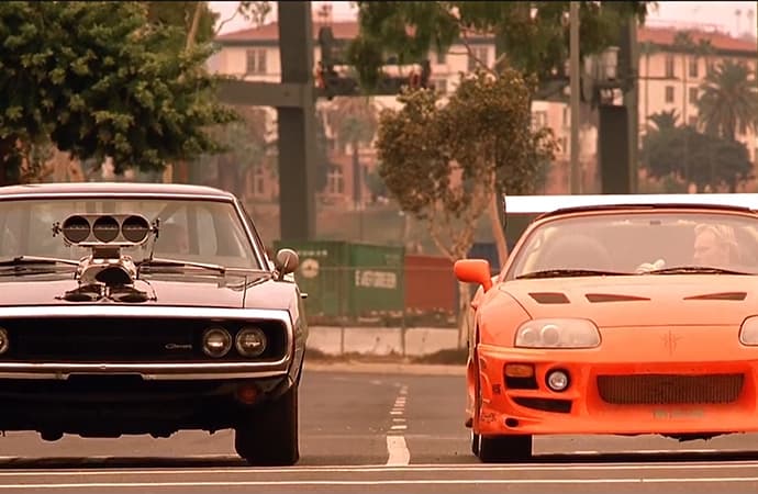 Two of the film's hero cars -- a 1970 Dodge Charger R/T and a 1993 Toyota Supra -- can fetch a premium price. | Screenshot