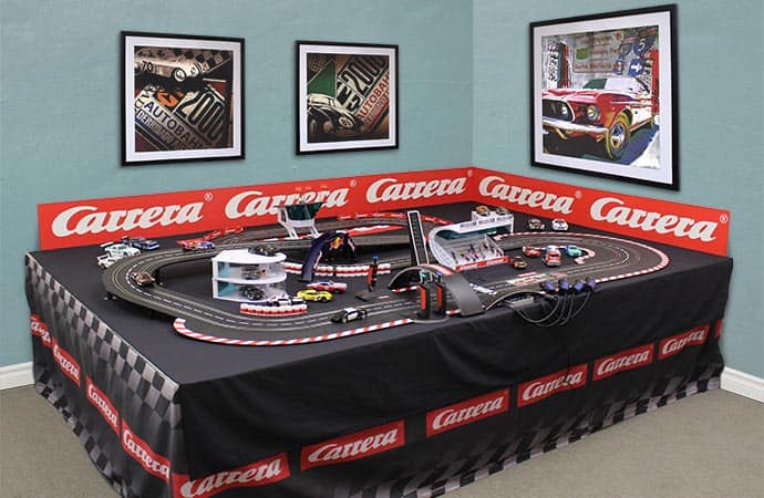Automotive prints from FramedArt.com line the walls at Carrera Toys. | Carrera Toys photo