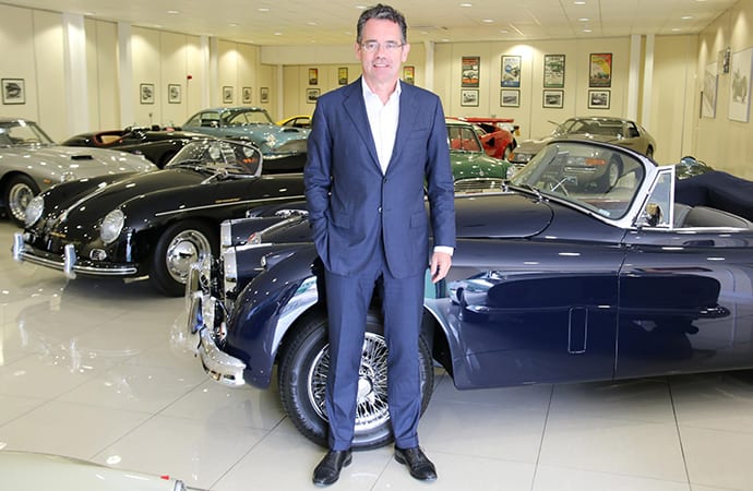 Woodham Mortimer Chairman and CEO Jean-Marc Gales stands in the former showroom of JD Classics. The British classic dealer and restorer was sold to Woodham Mortimer after entering administration last week. | Woodham Mortimer photo