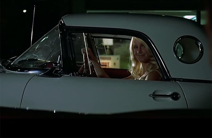 A young Suzanne Somers cruises in a 1955 Ford Thunderbird in American Graffiti. | Universal Pictures Screenshot