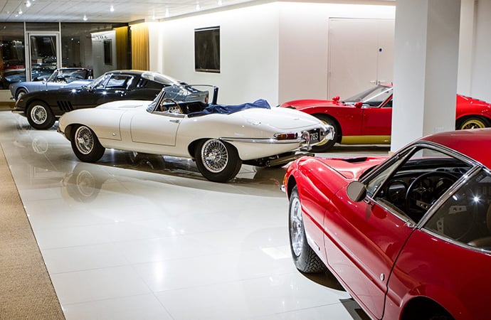 A JD Classics showroom is shown. The dealer's founder, Derek Hood, and his wife have been sued and accused of inflating values for some cars. | Facebook photo