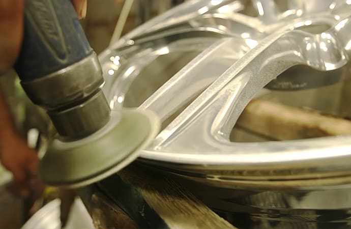 Learn how the professionals repair curb rash and scuffed wheels. | Screenshot