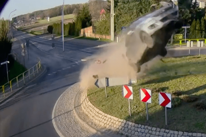 Hang time! Polish driver launches off roundabout