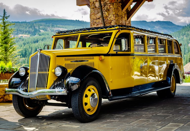 Vintage Yellowstone tour bus going back to work