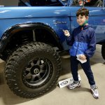 _DSC1886-Ash checks out a Ford Bronco Custom-One tire weighs more than Ash