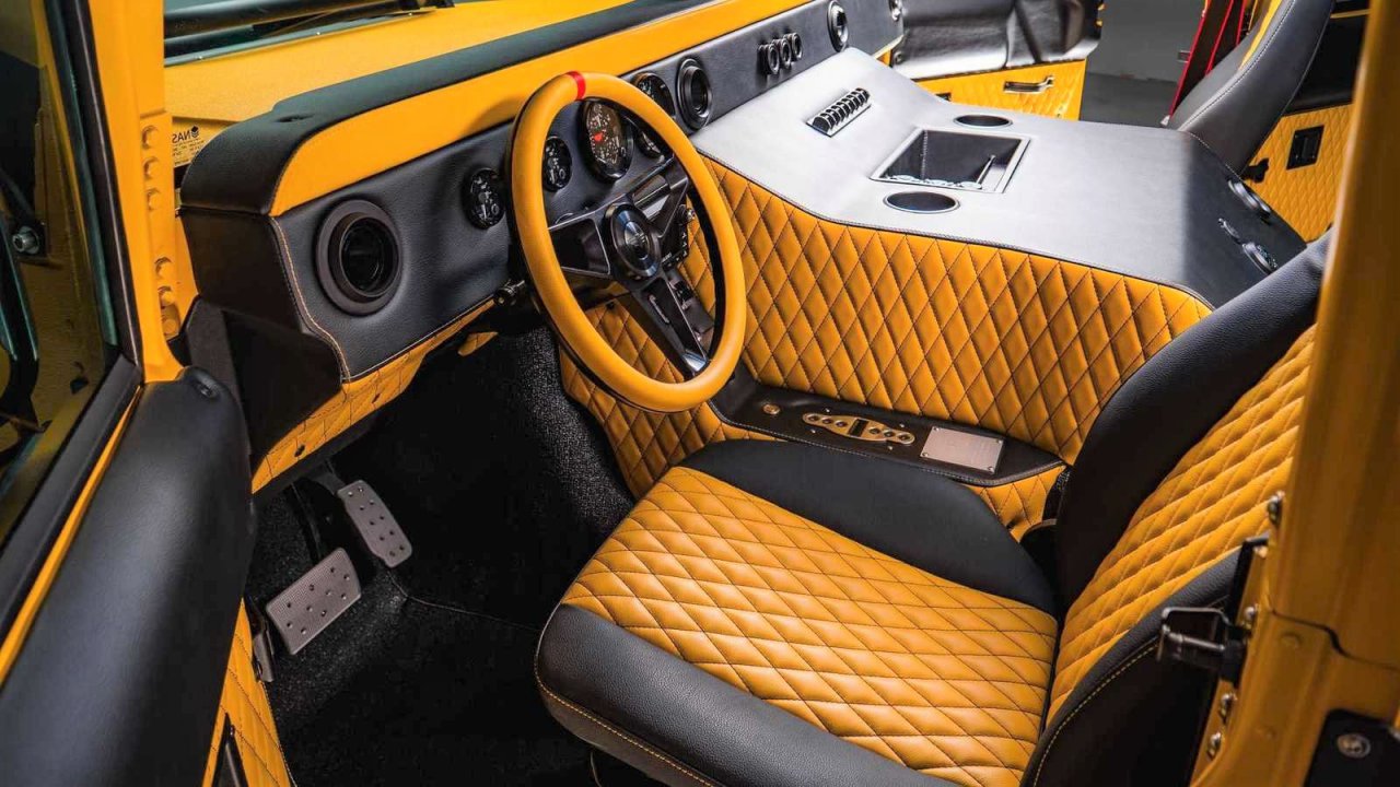 Bright yellow Mil-Spec M1-R is an 800-hp go-anywhere, look-at-me off-road Hummer H1