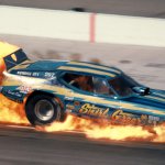 Shirl Greer-Mach 1 Mustang Funny Car- Chain Lighting at OMS in flames-1974 World Finals-Howard Koby photo copy