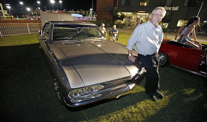 David Dean, assistant professor of history, poses aside his 1965 Corvair at the Lopes Country Fair | Grand Canyon University photos