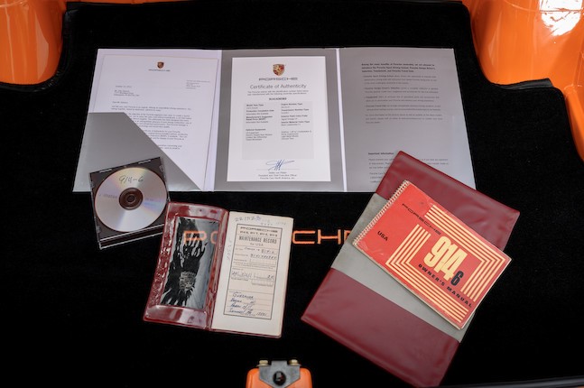 Porsche Certificate of Authenticity, CD with restoration documentation, original maintenance booklet, and owner's manual